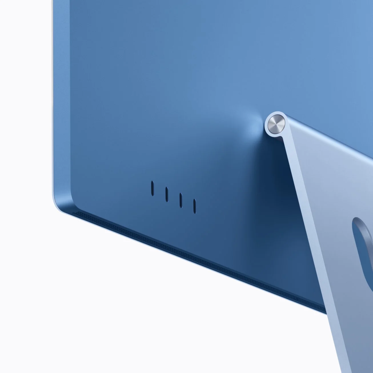 ภาพระยะใกล้พอร์ตสี่ช่องด้านหลัง iMac สีน้ำเงิน